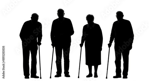 Silhouettes of four elderly people standing with canes.