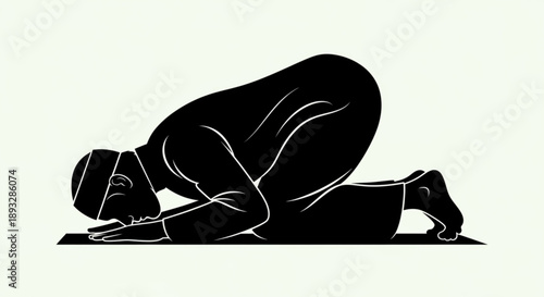 Man in prostrate position on prayer mat head to ground in dark silhouette on light background