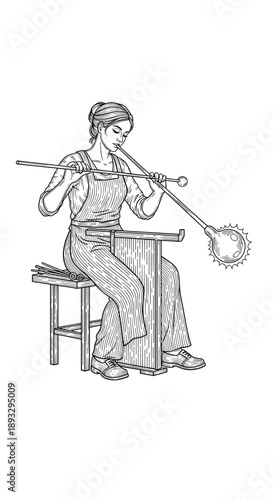 Woman glassblower creating art with molten glass in workshop