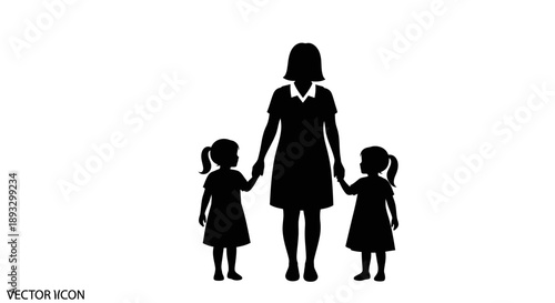 Silhouette of a mother holding hands with her two young daughters.