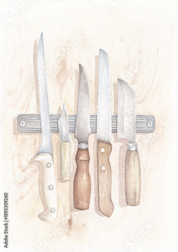 Vintage Old Kitchen Knives hanging on magnetic knife holder on wooden wall in kitchen in old house in the village