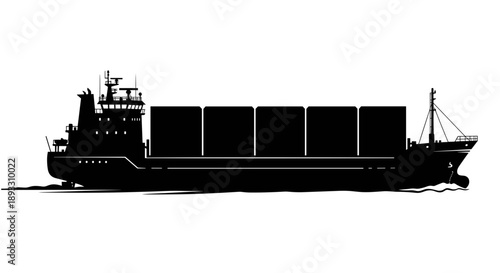 Silhouette of a large cargo ship carrying containers on the water.