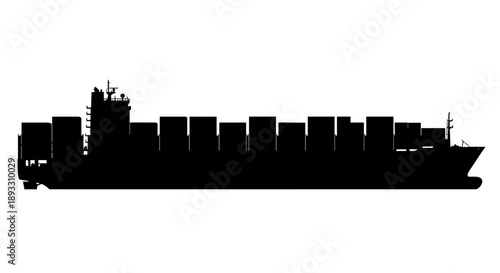 Silhouette of a large cargo ship carrying containers across the ocean.