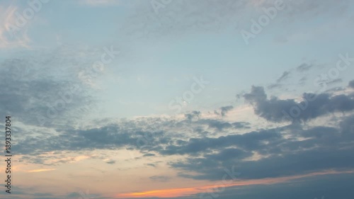 Clouds with orange sunrise on a beautiful sky in the morning, time-lapse video of early morning sunrise with beautiful sky
