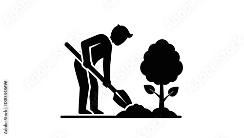 Person planting a small tree with a shovel.