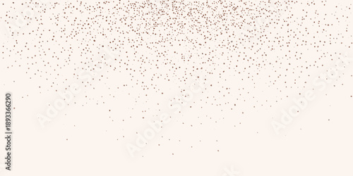 A scattering of delicate rose gold glitter particles on a soft background