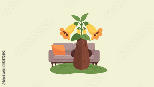 A whimsical brown creature with yellow flowers on its head sits before a gray couch