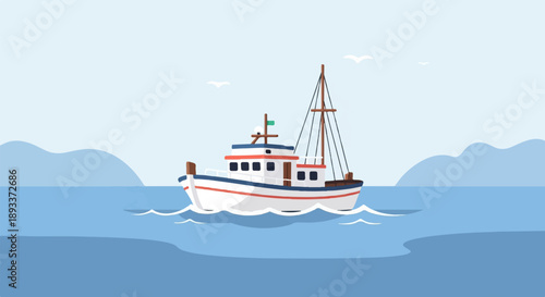 A white and red fishing boat sails on calm blue water