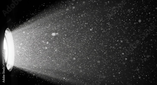 projector light beam with dust particles in dark