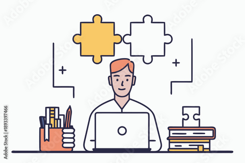Creative designer working on laptop with puzzle pieces
