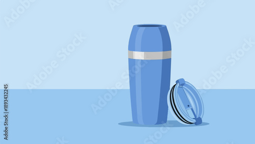 Blue thermos and its lid rest on a light blue surface with a solid blue background