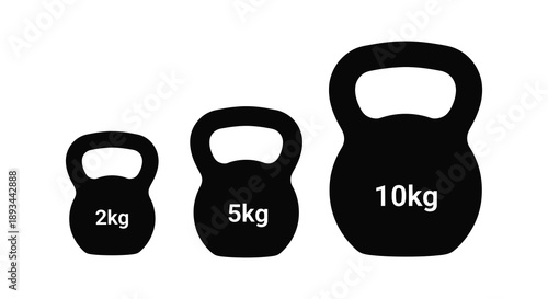 Three black kettlebells with weight markings a striking silhouette high quality