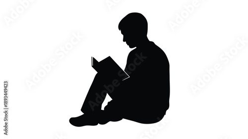 a man sitting and reading a book depicted in a stark silhouette