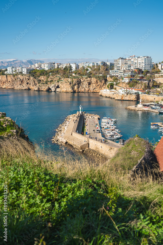 Fototapeta premium View of the Old Town Antalya Marina and tour boats in Kaleici
