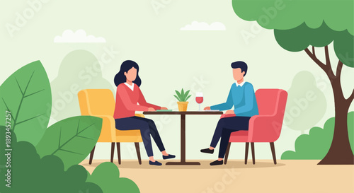 Couple enjoying a meal at an outdoor cafe with lush greenery