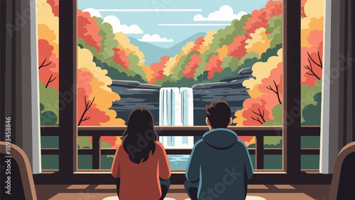 Couple watches vibrant autumn waterfall from inside cozy room