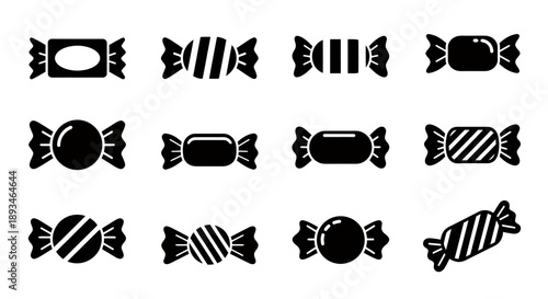 Collection of various wrapped candies, showcasing different shapes and designs in black and white.