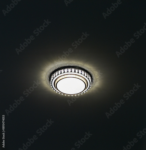 Decorative lights on the ceiling in the conference room.