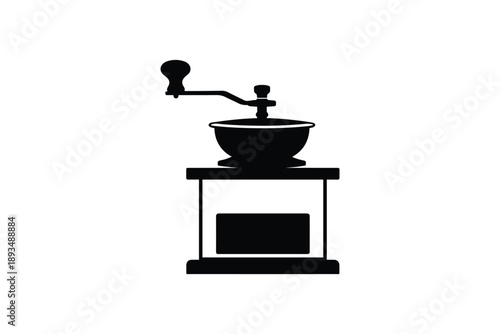Black silhouette of a vintage coffee grinder with a crank on a stand on white background