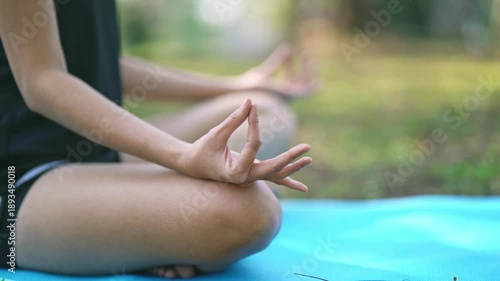 Wallpaper Mural Serene Meditation Moment with Hands in Mudra Position on a Yoga Mat in an Outdoor Tranquil Environment Surrounded by Nature and Soft Light Torontodigital.ca