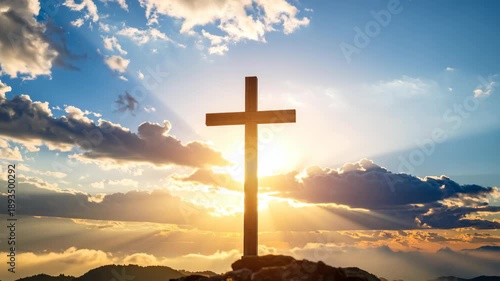 Wooden cross silhouetted against a brilliant sunburst sky with dramatic clouds.