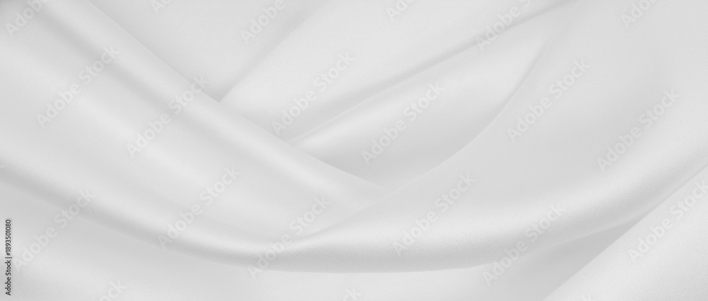 Obraz premium Smooth elegant white silk or satin luxury cloth texture as wedding background. Luxurious background design
