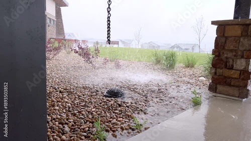 Water Draining Through River Rock During Storm