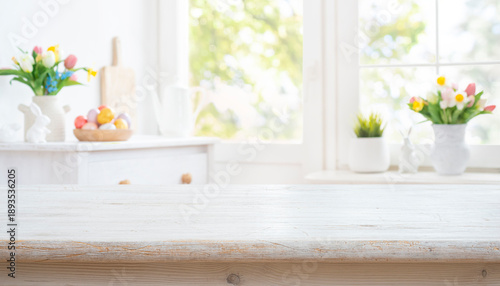 Empty wooden table for product display on decorated for Easter celebration blurred kitchen background