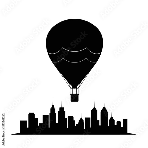 A hot air balloon floating above a city skyline at sunset