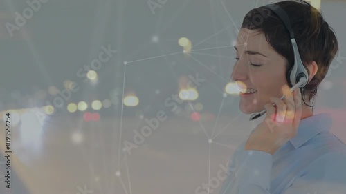 Animation of caucasian customer agent talking on headphones and connected dots on moving vehicles