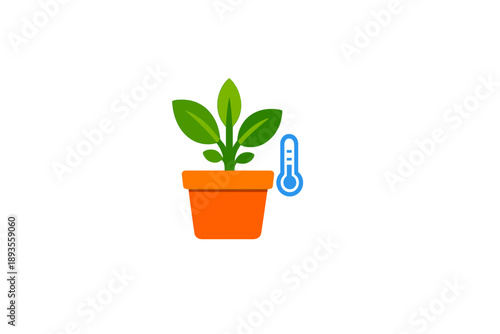 Plant in orange pot with thermometer showing temperature for growth conditions in a home indoor environment