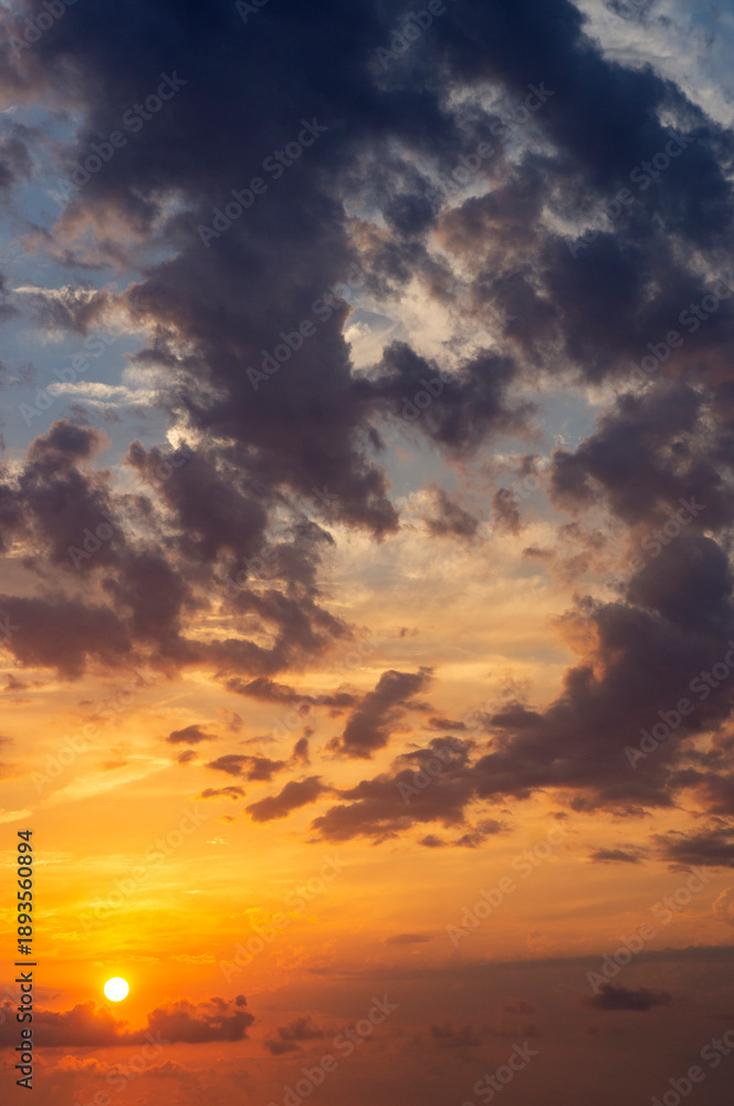 Fototapeta premium Colorful sunset at the sea, clouds