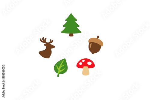 Forest elements like a tree, acorn, mushroom, deer, and leaf arranged in a circle on a white background to create a simple nature theme representation
