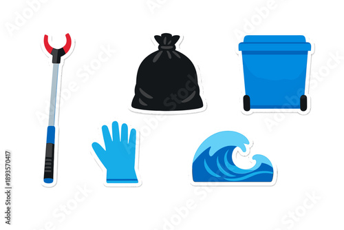 Cleaning tools and waste items used during beach cleanup on a sunny day by the ocean shore