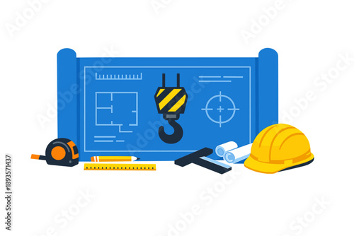 Tools and construction plan layout with equipment for building work in a workshop setting during daylight