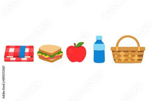 Enjoying lunch with a picnic basket, sandwich, apple, and water bottle on a blanket outdoors near the park on a sunny day