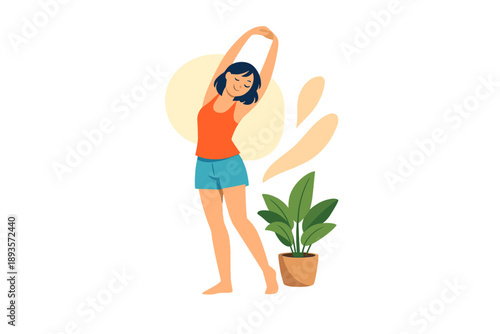 Woman stretching indoors next to potted plant in a bright and open space during daytime