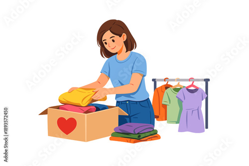 Woman organizing clothes into a box for donation while standing next to a clothes rack in a bright room during the day