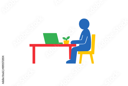 Person sits at desk with laptop and small plant in an office setting during daytime hours