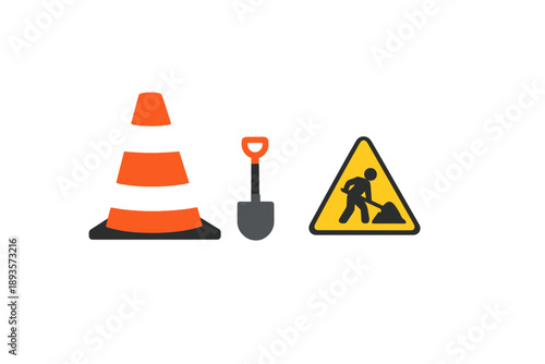 Construction tools and safety signs are arranged together showing items commonly found on work sites during daylight hours