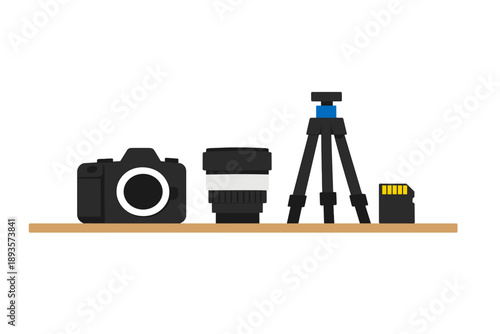 Camera and equipment set on a shelf ready for a photography session in a studio space
