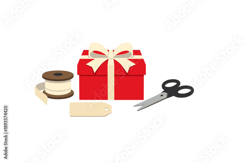 Gift box with wrapping tools is placed on white background