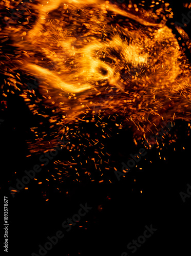 A fire is burning and the smoke is rising