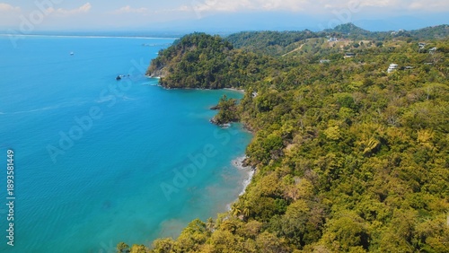 Wallpaper Mural Cliffside forest meeting turquoise ocean water in green lush tropical Costa Rica. Torontodigital.ca