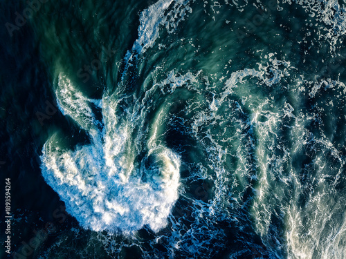Quadro em tela Top-down aerial of Atlantic waves crashing over limestone at Hook Head, winter s