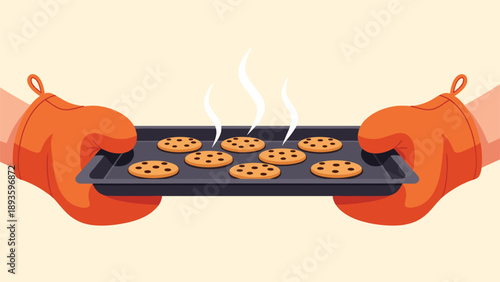 Hands wearing orange oven mitts hold up a baking tray filled with fresh, steaming hot, homemade chocolate chip cookies.