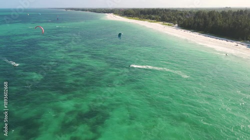 Aerial view of kitesurfers at paje beach, zanzibar