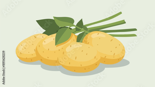 A cluster of golden potatoes with green leaves and stems