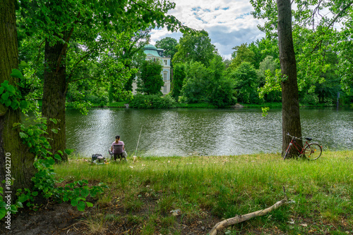 Photos Woman Fishing on Banks of Spree River Berlin with Historic Belvedere Charlottenb