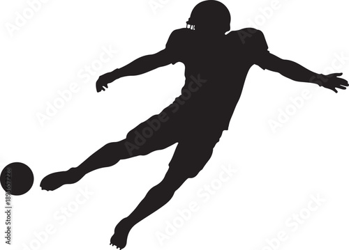 Silhouette of an American football player kicking a ball with extended leg